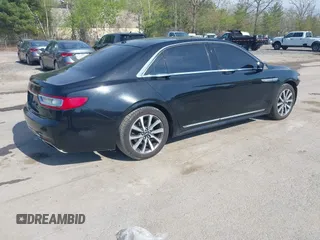 2017 Lincoln Continental Livery z VIN 1LN6L9HK0H5609577, wystawiony jako IAAI lot #42185192 z przebiegiem 232 644 mil mil oraz . Historia ofert i sprzedaży dostępna na DreamBid. Obrazek 4.