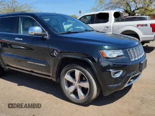 2014 Jeep Grand Cherokee Overland with VIN 1C4RJFCT7EC187319, listed as a Copart auction lot 55284615 with 98,314 mi miles and Clean Title. Bid and sale history available at DreamBid. Image 1.