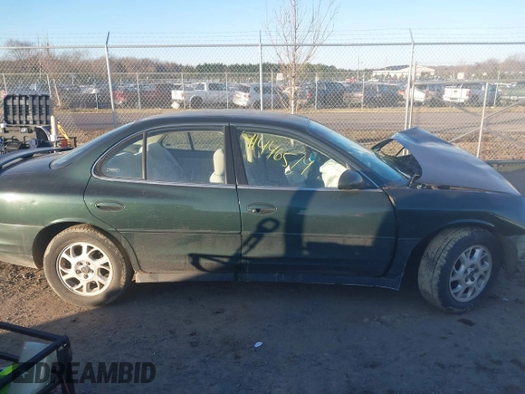2001 Oldsmobile Intrigue GX z VIN 1G3WH52H11F127437, wystawiony jako IAAI lot #41446574 z przebiegiem Nie podano mil oraz . Historia ofert i sprzedaży dostępna na DreamBid. Obrazek 12.