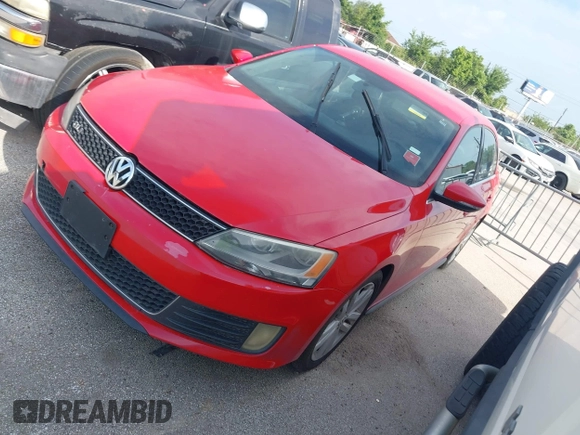 2012 Volkswagen Jetta Autobahn with VIN 3VW567AJ2CM451272, listed as a IAAI auction lot 42534240 with 173,256 mi miles and . Bid and sale history available at DreamBid. Image 2.