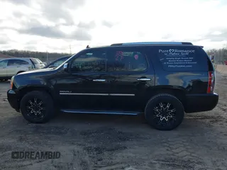 2012 GMC Yukon Denali with VIN 1GKS2EEF8CR320121, listed as a IAAI auction lot 41976562 with 157,050 mi miles. Bid and sale history available at carsss.com. Image 14.