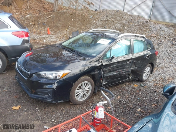 2017 Subaru Impreza Premium with VIN 4S3GTAB69H3704625, listed as a IAAI auction lot 41864611 with 71,352 mi miles. Bid and sale history available at carsss.com. Image 2.