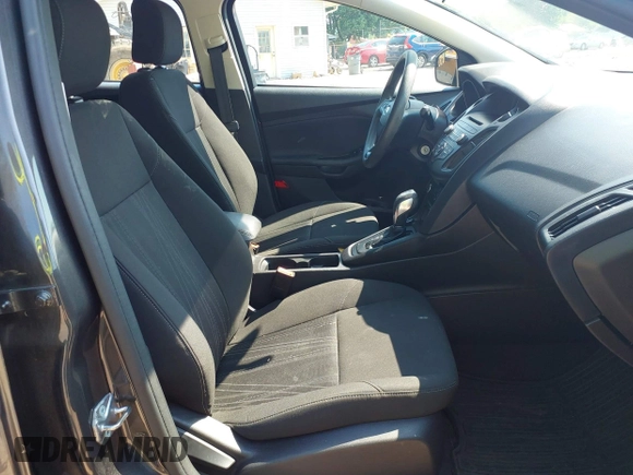 2015 Ford Focus SE with VIN 1FADP3F25FL300945, listed as a IAAI auction lot 42483699 with 76,992 mi miles and . Bid and sale history available at DreamBid. Image 5.