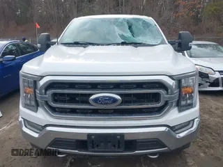2021 Ford F-150 XL with VIN 1FTEW1EPXMFC83574, listed as a IAAI auction lot 41694174 with 57,814 mi miles. Bid and sale history available at carsss.com. Image 12.