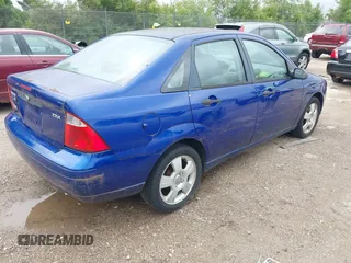 2005 Ford Focus S with VIN 1FAFP34N35W229229, listed as a IAAI auction lot 42738975 with 107,388 mi miles and . Bid and sale history available at DreamBid. Image 4.