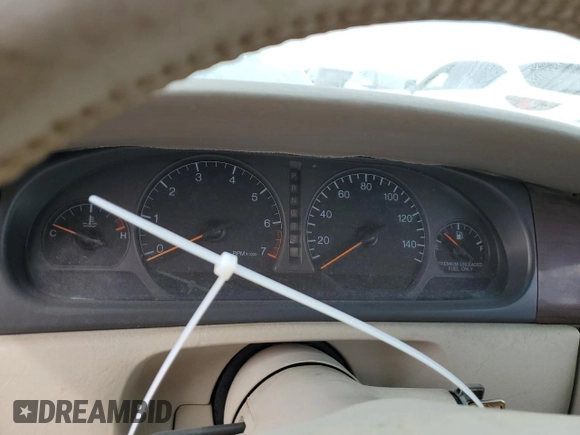 1999 Cadillac Eldorado z VIN 1G6EL12Y7XU615169, wystawiony jako Copart lot #76459744 z przebiegiem Nie podano mil oraz Szkoda całkowita • Salvage title. Historia ofert i sprzedaży dostępna na DreamBid. Obrazek 9.