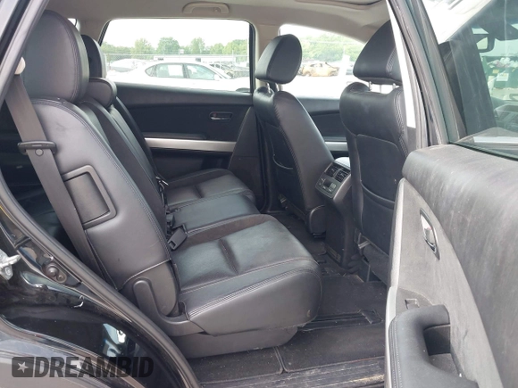 2015 Mazda CX-9 Grand Touring z VIN JM3TB2DA1F0456773, wystawiony jako IAAI lot #42257555 z przebiegiem 152 890 mil mil oraz . Historia ofert i sprzedaży dostępna na DreamBid. Obrazek 8.