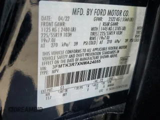 2022 Ford Mustang Mach-E Premium z VIN 3FMTK3R7XNMA24055, wystawiony jako Copart lot #62717525 z przebiegiem 25 079 mil mil oraz Szkoda całkowita • Salvage title. Historia ofert i sprzedaży dostępna na DreamBid. Obrazek 13.