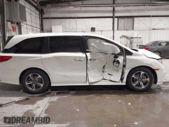2019 Honda Odyssey Touring with VIN 5FNRL6H83KB051363, listed as a IAAI auction lot 41173587 with 88,512 mi miles. Bid and sale history available at carsss.com. Image 12.
