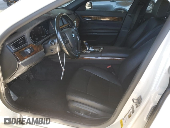 2014 BMW 7 Series 740i with VIN WBAYA6C59ED144122, listed as a Copart auction lot 75059334 with 78,090 mi miles and Salvage Title. Bid and sale history available at carsss.com. Image 7.