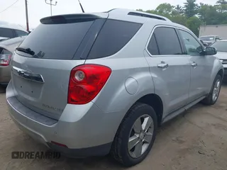 2013 Chevrolet Equinox LTZ with VIN 2GNFLGEK1D6146934, listed as a IAAI auction lot 42227813 with 151,566 mi miles and . Bid and sale history available at DreamBid. Image 4.