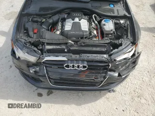 2014 Audi A6 Prestige z VIN WAUHGAFC8EN062243, wystawiony jako Copart lot #54622005 z przebiegiem 106 729 mil mil oraz Szkoda całkowita • Salvage title. Historia ofert i sprzedaży dostępna na DreamBid. Obrazek 11.