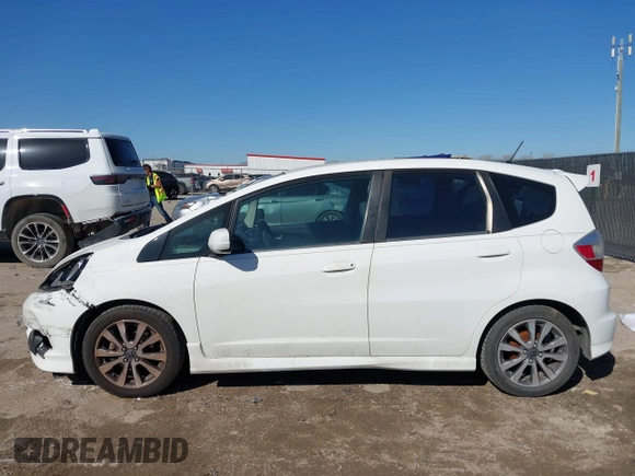 2012 Honda Fit Sport with VIN JHMGE8H51CC041804, listed as a IAAI auction lot 41772371 with 138,116 mi miles and . Bid and sale history available at DreamBid. Image 14.