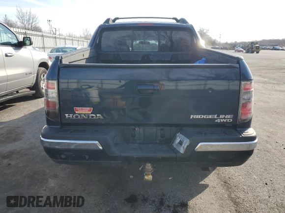2012 Honda Ridgeline RTL z VIN 5FPYK1F51CB455815, wystawiony jako Copart lot #50969885 z przebiegiem Nie podano mil oraz Szkoda całkowita • Salvage title. Historia ofert i sprzedaży dostępna na DreamBid. Obrazek 6.