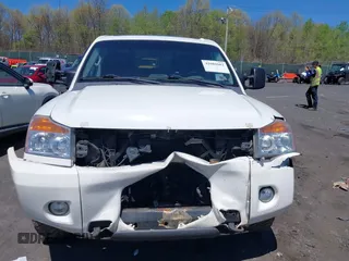 2012 Nissan Titan SV with VIN 1N6AA0EC0CN307743, listed as a IAAI auction lot 42085082 with 187,506 mi miles. Bid and sale history available at carsss.com. Image 12.