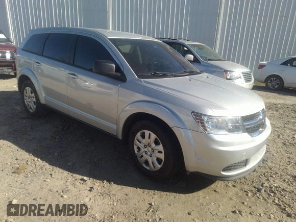 2014 Dodge Journey American Value Pkg with VIN 3C4PDCAB2ET186199, listed as a IAAI auction lot 41594478 with 145,936 mi miles. Bid and sale history available at carsss.com. Image 1.