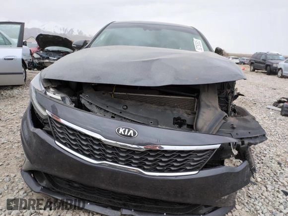 2019 Kia Optima LX z VIN 5XXGT4L31KG320187, wystawiony jako Copart lot #50750805 z przebiegiem Nie podano mil oraz Szkoda całkowita • Salvage title. Historia ofert i sprzedaży dostępna na DreamBid. Obrazek 5.