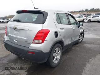 2015 Chevrolet Trax LS with VIN 3GNCJPSBXFL256473, listed as a IAAI auction lot 41130809 with 106,923 mi miles and . Bid and sale history available at DreamBid. Image 4.