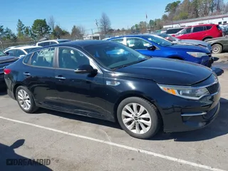 2016 Kia Optima LX with VIN 5XXGT4L3XGG013835, listed as a IAAI auction lot 41815349 with 120,628 mi miles. Bid and sale history available at carsss.com. Image 13.