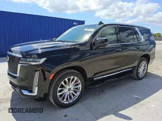 2023 Cadillac Escalade 4WD Premium Luxury z VIN 1GYS4BKL7PR332923, wystawiony jako Copart lot #57442025 z przebiegiem 56 886 mil mil oraz Tytuł czysty. Historia ofert i sprzedaży dostępna na DreamBid. Obrazek 1.