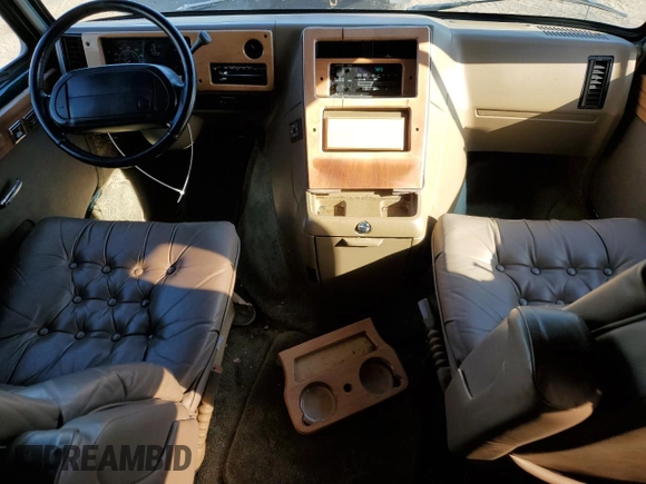 1995 Chevrolet Chevy Van z VIN 1GBEG25K3SF249372, wystawiony jako Copart lot #72284224 z przebiegiem 72 331 mil mil oraz Tytuł czysty. Historia ofert i sprzedaży dostępna na DreamBid. Obrazek 8.