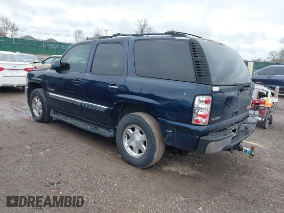 2005 GMC Yukon SLT with VIN 1GKEC13T45J139885, listed as a IAAI auction lot 41796394 with 229,494 mi miles. Bid and sale history available at carsss.com. Image 3.