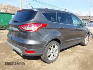 2016 Ford Escape Titanium with VIN 1FMCU9JX5GUA65412, listed as a IAAI auction lot 41859123 with 80,208 mi miles and . Bid and sale history available at DreamBid. Image 4.