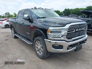 2022 Ram 2500 Laramie with VIN 3C6UR5FJ2NG305658, listed as a IAAI auction lot 42362662 with 50,701 mi miles and . Bid and sale history available at DreamBid. Image 1.
