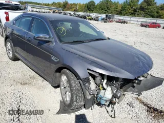 2013 Ford Taurus Limited with VIN 1FAHP2F83DG221702, listed as a Copart auction lot 51580255 with 174,364 mi miles and Salvage title. Bid and sale history available at DreamBid. Image 1.
