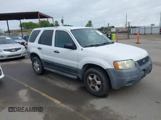 2004 Ford Escape XLS with VIN 1FMYU02104KB25647, listed as a IAAI auction lot 41916737 with 199,361 mi miles and . Bid and sale history available at DreamBid. Image 1.