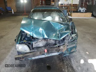 1996 Toyota Tercel DX z VIN JT2BC52L7T7044201, wystawiony jako Copart lot #77190074 z przebiegiem Nie podano mil oraz Szkoda całkowita • Salvage title. Historia ofert i sprzedaży dostępna na DreamBid. Obrazek 5.