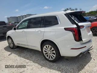 2020 Cadillac XT6 FWD Premium Luxury z VIN 1GYKPCRS7LZ235645, wystawiony jako Copart lot #58977995 z przebiegiem 42 504 mil mil oraz Nie do naprawy • Non repairable. Historia ofert i sprzedaży dostępna na DreamBid. Obrazek 2.