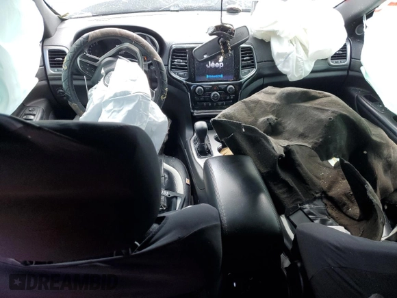 2019 Jeep Grand Cherokee Altitude with VIN 1C4RJFAG5KC591141, listed as a Copart auction lot 56885105 with 88,000 mi miles and Salvage title. Bid and sale history available at DreamBid. Image 8.