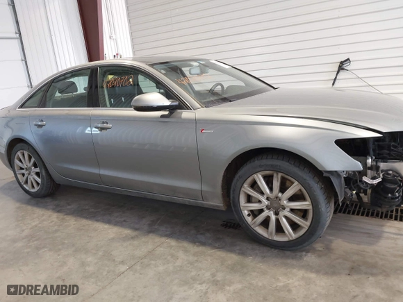 2013 Audi A6 3.0T Premium Plus with VIN WAUGGAFC3DN066310, listed as a IAAI auction lot 42020702 with 195,939 mi miles. Bid and sale history available at carsss.com. Image 14.