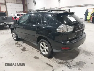 2004 Lexus RX with VIN 2T2HA31U74C036035, listed as a IAAI auction lot 42195070 with 200,689 mi miles. Bid and sale history available at carsss.com. Image 3.