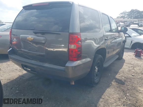 2012 Chevrolet Tahoe Commercial with VIN 1GNLC2E07CR187432, listed as a IAAI auction lot 42126539 with 169,607 mi miles and . Bid and sale history available at DreamBid. Image 4.