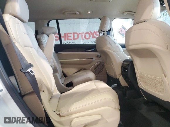 2022 Jeep Grand Cherokee Limited z VIN 1C4RJKBG8N8565275, wystawiony jako Copart lot #61261725 z przebiegiem 27 503 mil mil oraz Szkoda całkowita • Salvage title. Historia ofert i sprzedaży dostępna na DreamBid. Obrazek 11.