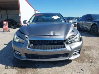 2015 Infiniti Q50 Premium z VIN JN1BV7AR9FM408386, wystawiony jako IAAI lot #42084887 z przebiegiem 122 527 mil mil oraz . Historia ofert i sprzedaży dostępna na DreamBid. Obrazek 13.