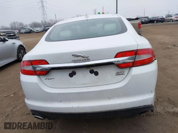 2015 Jaguar XF V6 Portfolio with VIN SAJWJ0FF2F8U59934, listed as a IAAI auction lot 41558305 with 120,219 mi miles. Bid and sale history available at carsss.com. Image 16.
