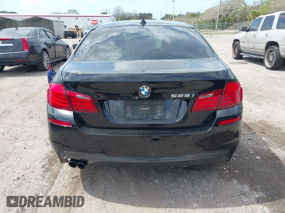 2013 BMW 5 Series 528i with VIN WBAXG5C51DDY33333, listed as a IAAI auction lot 41685179 with 94,936 mi miles and . Bid and sale history available at carsss.com. Image 16.