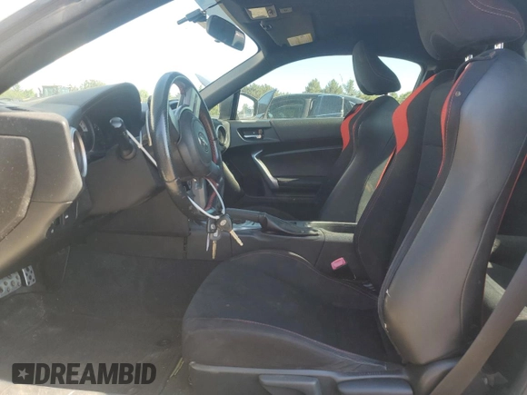 2014 Scion FR-S z VIN JF1ZNAA16E8702862, wystawiony jako Copart lot #57879575 z przebiegiem 101 775 mil mil oraz Szkoda całkowita • Salvage title. Historia ofert i sprzedaży dostępna na DreamBid. Obrazek 7.
