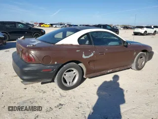 1997 Ford Mustang with VIN 1FALP4043VF174092, listed as a Copart auction lot 86983884 with 105,774 mi miles and Salvage Title. Bid and sale history available at carsss.com. Image 3.