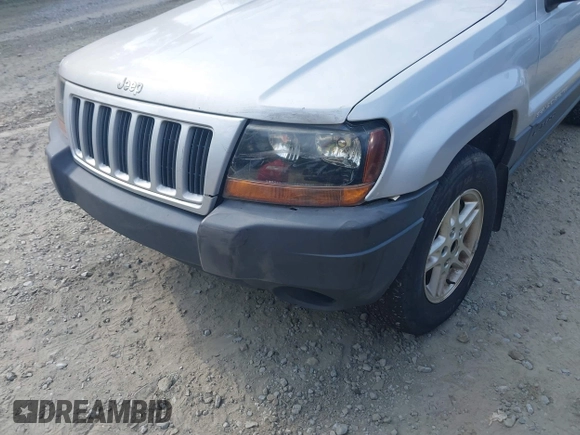 2004 Jeep Grand Cherokee Laredo z VIN 1J4GW48S54C106405, wystawiony jako IAAI lot #42315689 z przebiegiem 104 416 mil mil oraz . Historia ofert i sprzedaży dostępna na DreamBid. Obrazek 6.