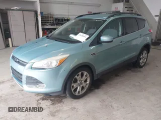2013 Ford Escape SE with VIN 1FMCU0GX6DUC09872, listed as a IAAI auction lot 42020093 with 215,906 mi miles and . Bid and sale history available at DreamBid. Image 18.