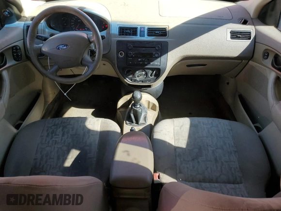 2005 Ford Focus S with VIN 1FAFP34N75W276781, listed as a Copart auction lot 71846484 with 192,448 mi miles and Salvage Title. Bid and sale history available at carsss.com. Image 8.