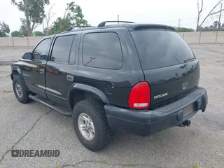 1999 Dodge Durango z VIN 1B4HS28Y2XF601465, wystawiony jako IAAI lot #41686754 z przebiegiem 168 550 mil mil oraz . Historia ofert i sprzedaży dostępna na DreamBid. Obrazek 3.