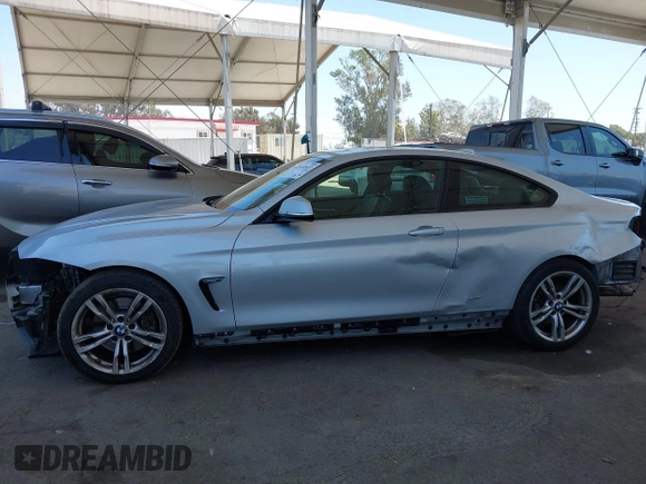 2014 BMW 4 Series 428i with VIN WBA3N7C58EF719514, listed as a IAAI auction lot 42310537 with 82,573 mi miles and . Bid and sale history available at DreamBid. Image 15.