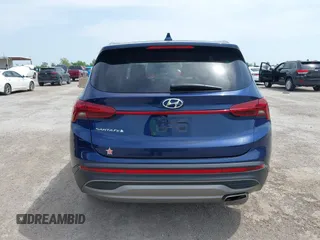 2021 Hyundai Santa Fe SE with VIN 5NMS14AJ2MH339403, listed as a IAAI auction lot 42024896 with 91,734 mi miles and . Bid and sale history available at DreamBid. Image 16.