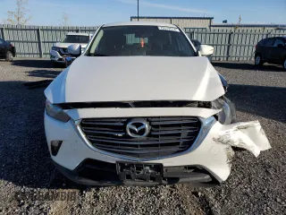 2020 Mazda CX-3 GS z VIN JM1DKFC79L1472123, wystawiony jako Copart lot #73379514 z przebiegiem 85 815 mil mil oraz Szkoda całkowita • Salvage title. Historia ofert i sprzedaży dostępna na DreamBid. Obrazek 5.