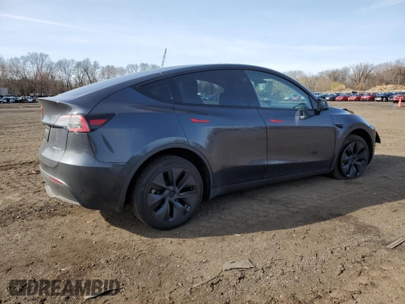 2025 Tesla Model Y Long Range with VIN 7SAYGDEE4SF291068, listed as a Copart auction lot 51204615 with 2,958 mi miles and Salvage Title. Bid and sale history available at DreamBid. Image 3.